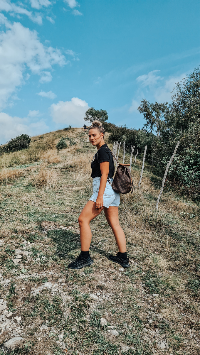 A Woman Walking on the Field